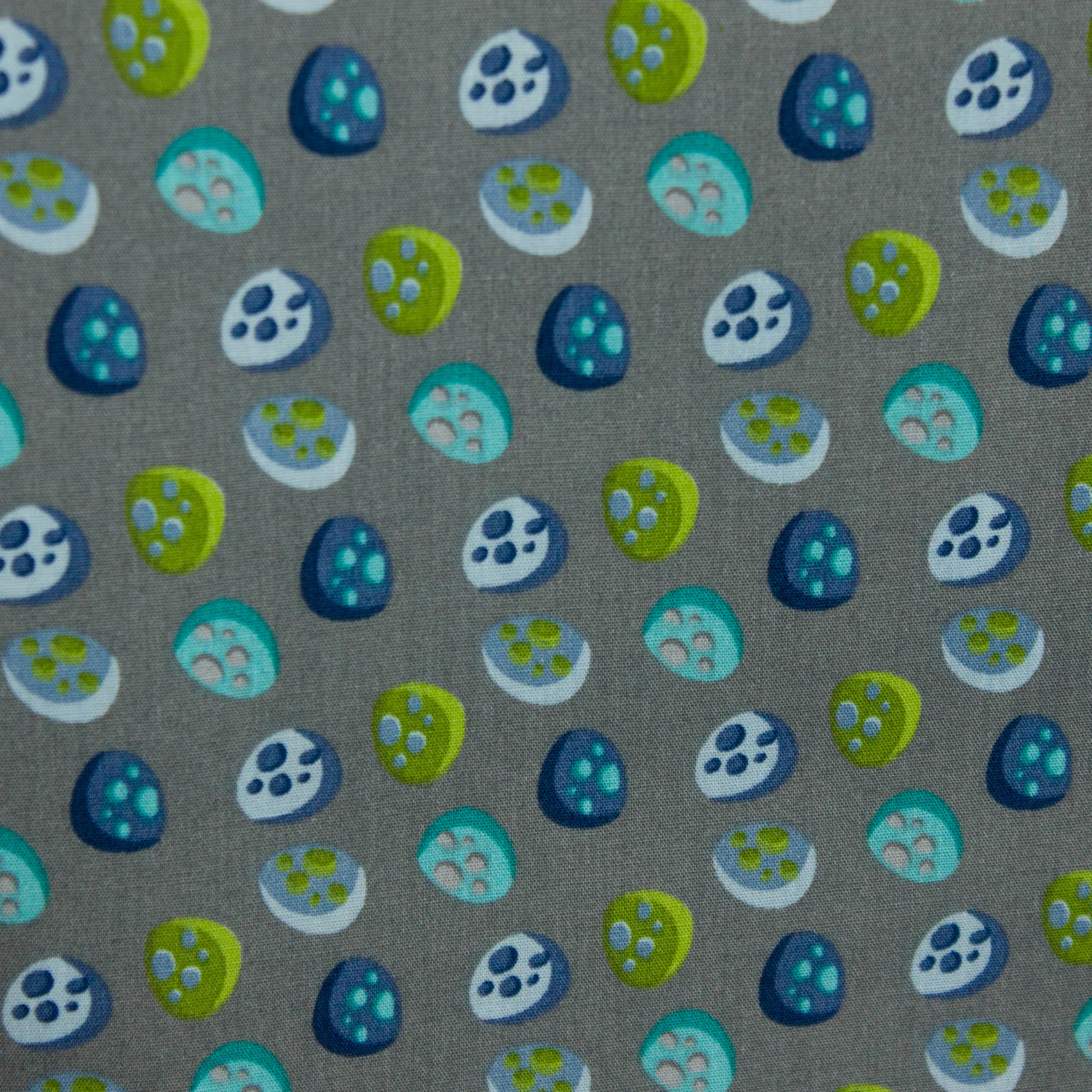 Grijze katoen met blauwe en groene stenen